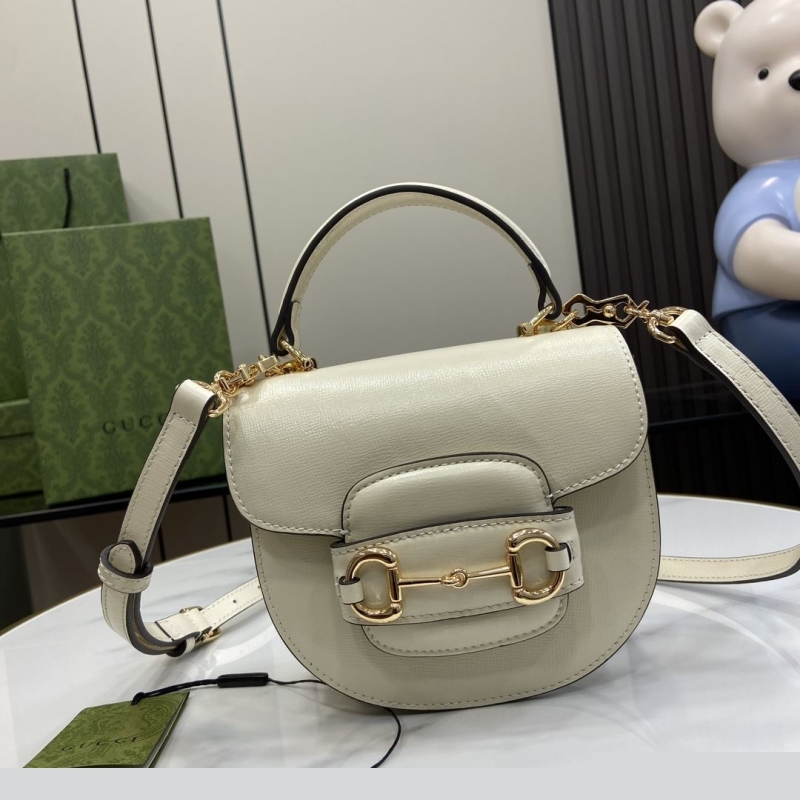 G*u*i top handle bags